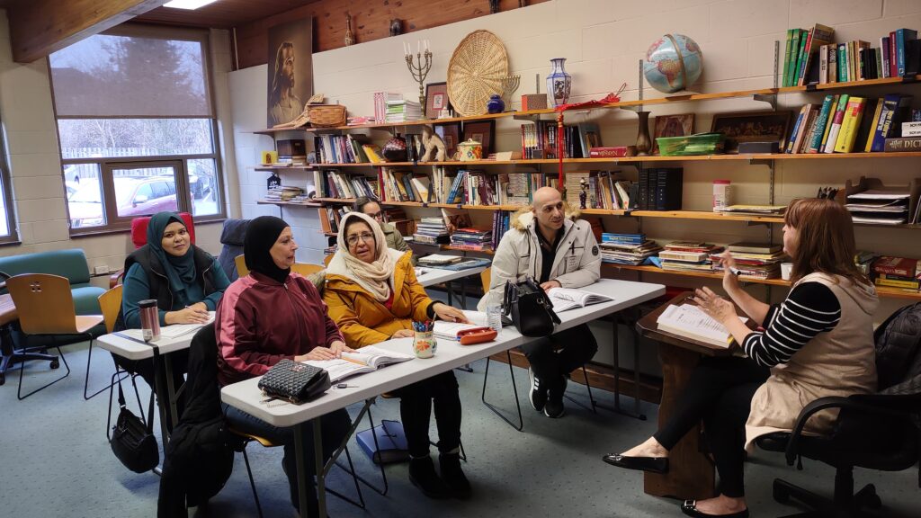 Students practice speaking English phrases.